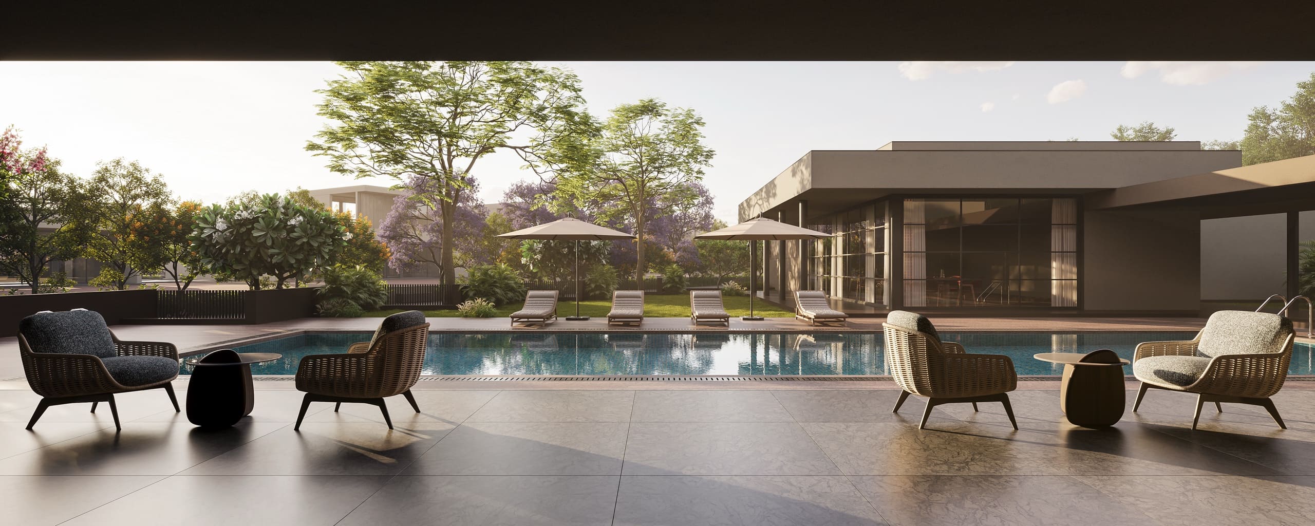 Anahata clubhouse exterior and landscaped pool